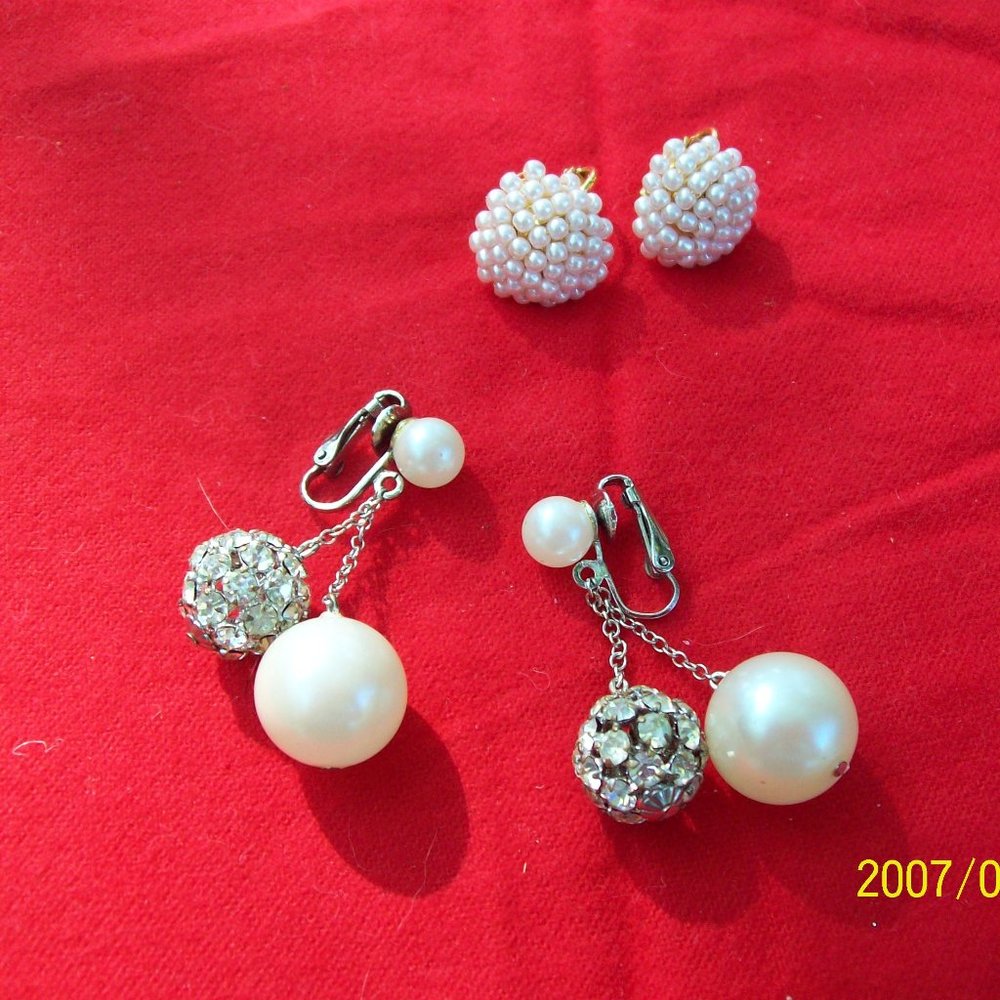 Two pair pearl clip on earrings